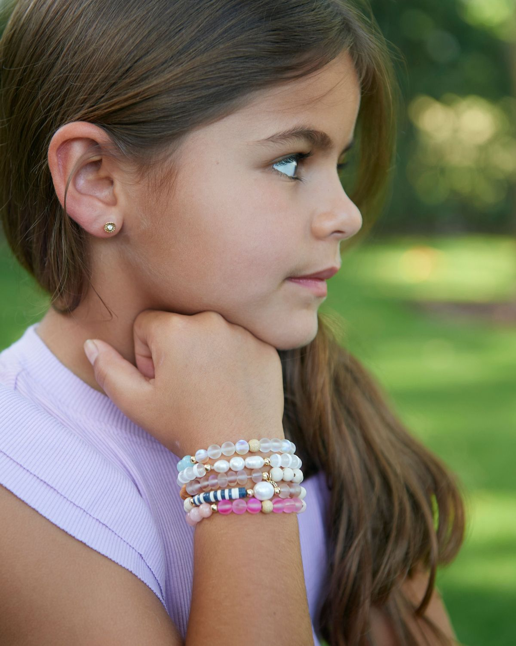Mother-daughter bracelets - young girl wearing colorful beaded bracelets by SARAH'S WHISPER