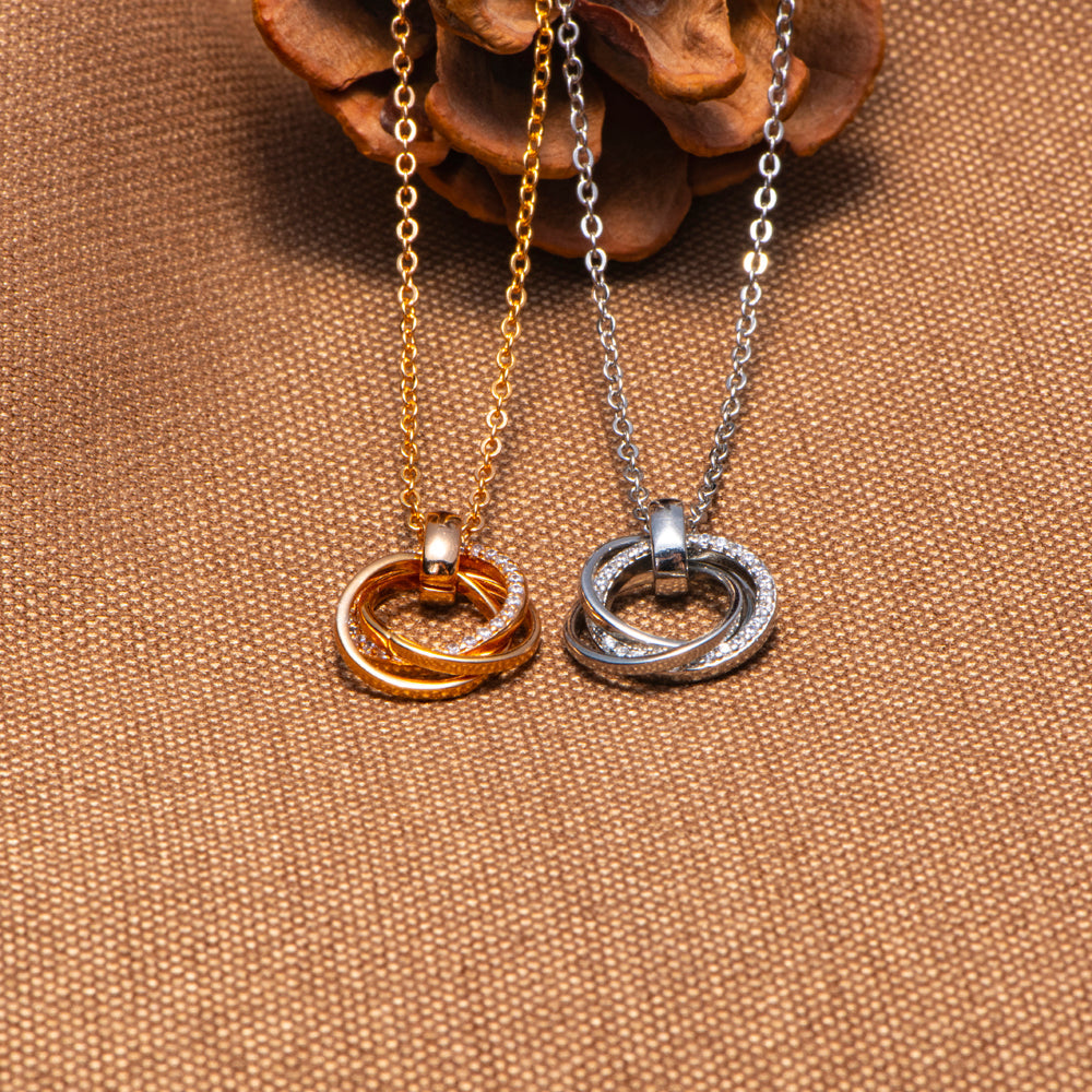 To Our Daughter "You will never outgrow our hearts" Triple Ring Necklace