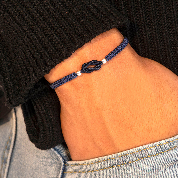 Grandson wearing rope bracelet wrist shot