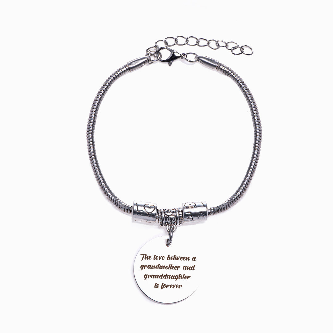 To My Granddaughter "The love between a grandmother and granddaughter is forever" Charm Bracelet