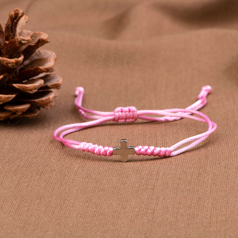 Cross bracelet symbolizing divine faith and uniqueness, perfect for your granddaughter. The image showcases a stylish bracelet adorned with a cross motif, reflecting love and individuality