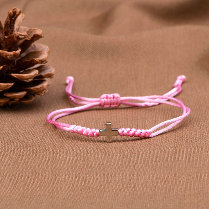 Cross bracelet symbolizing divine faith and uniqueness, perfect for your granddaughter. The image showcases a stylish bracelet adorned with a cross motif, reflecting love and individuality