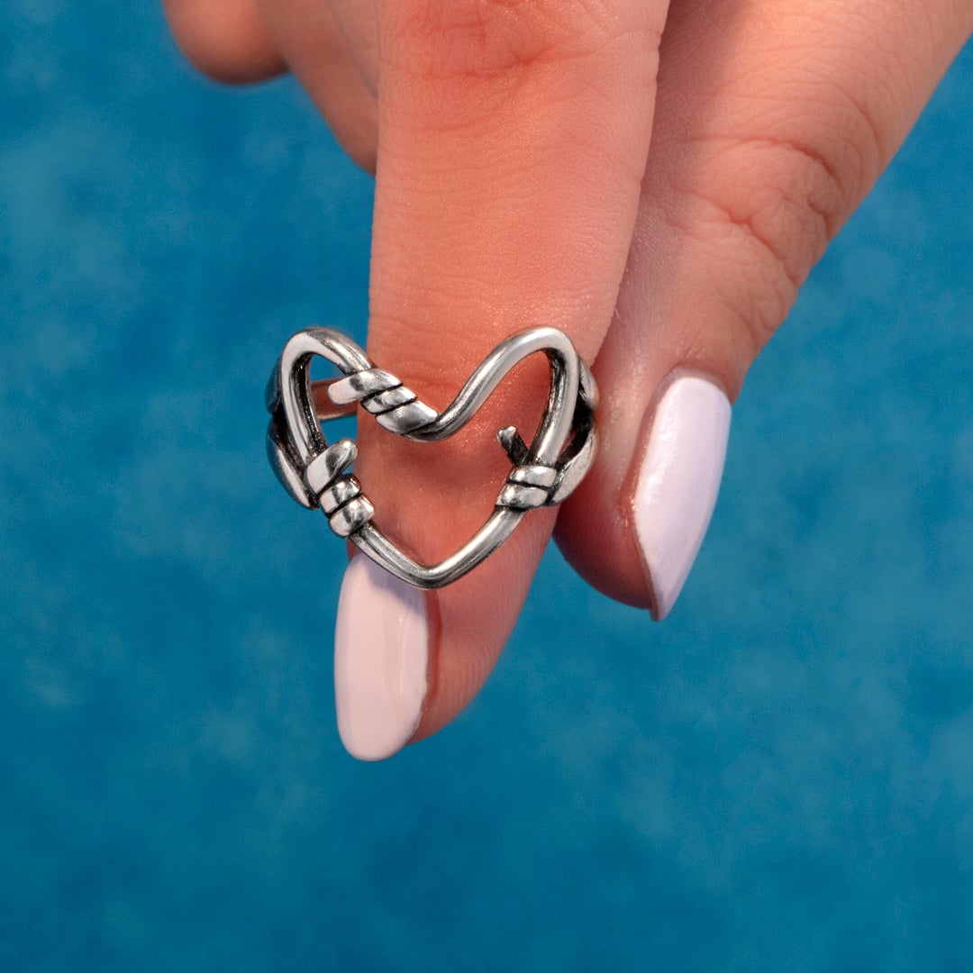 "Hold on to the dreams in your heart tightly" Holding Heart Ring