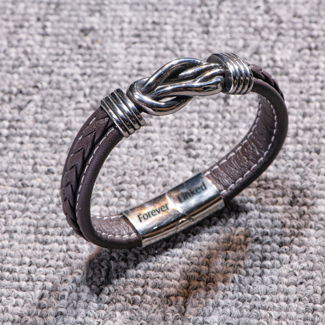 Detailed close-up of the braided leather on the son bracelet from mom.