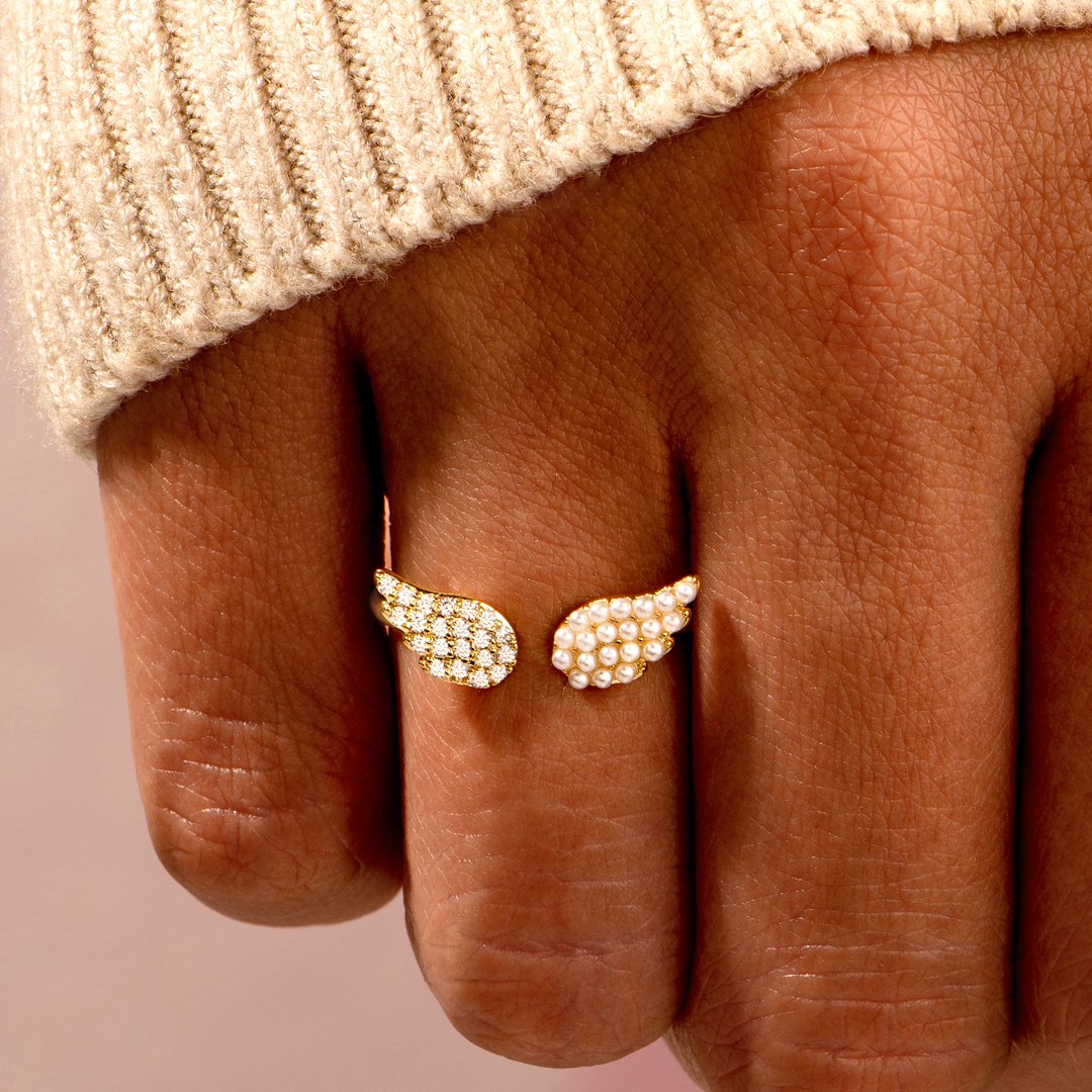 "To my daughter, shine wherever you go like pearls. They shine in the dark and are very precious as you." Adjustable Ring