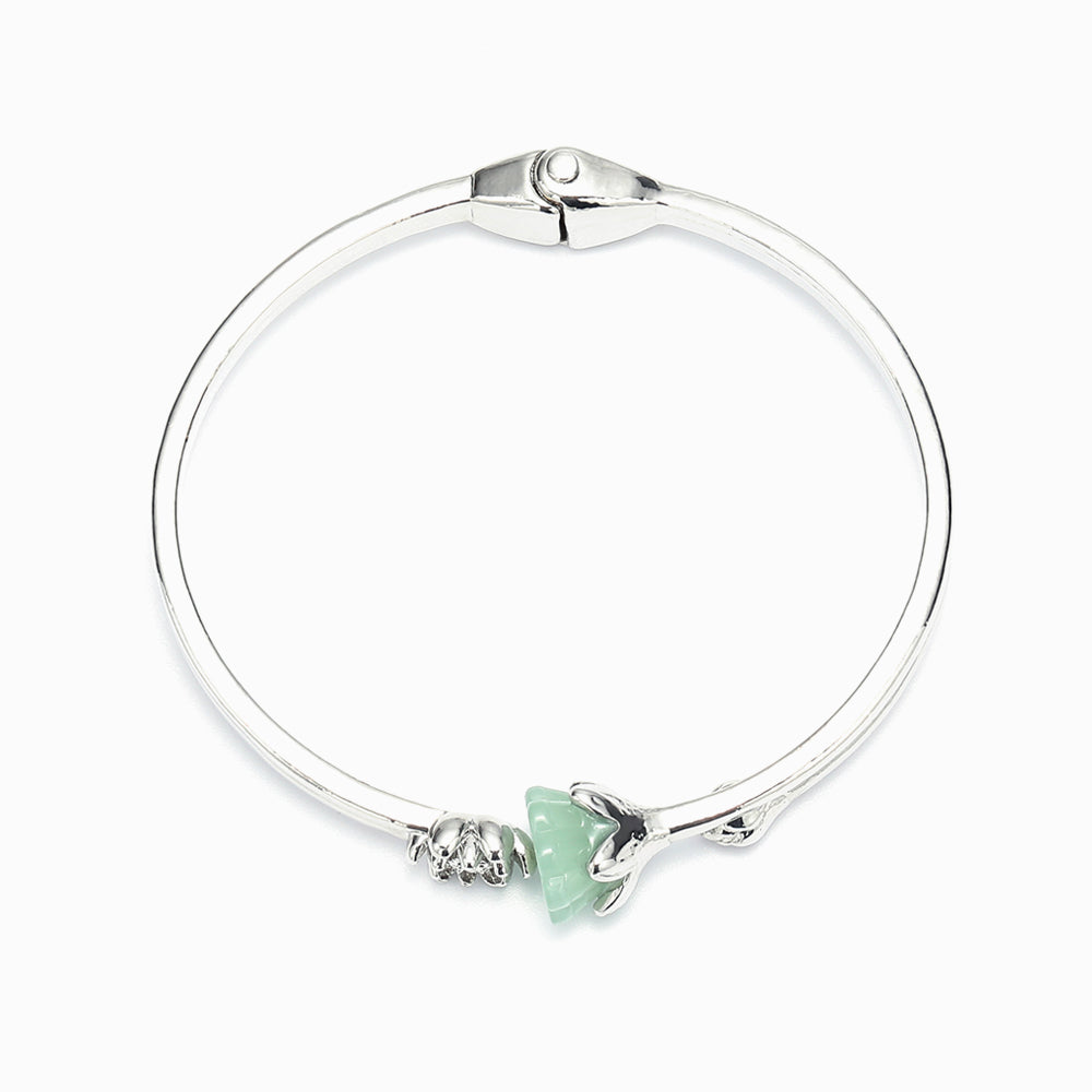 Gift card with inspirational message alongside jade lotus bracelet