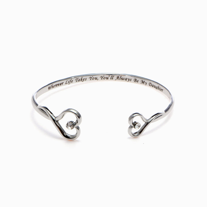 Mother and daughter birthstone bracelet close-up on white background - double heart design.