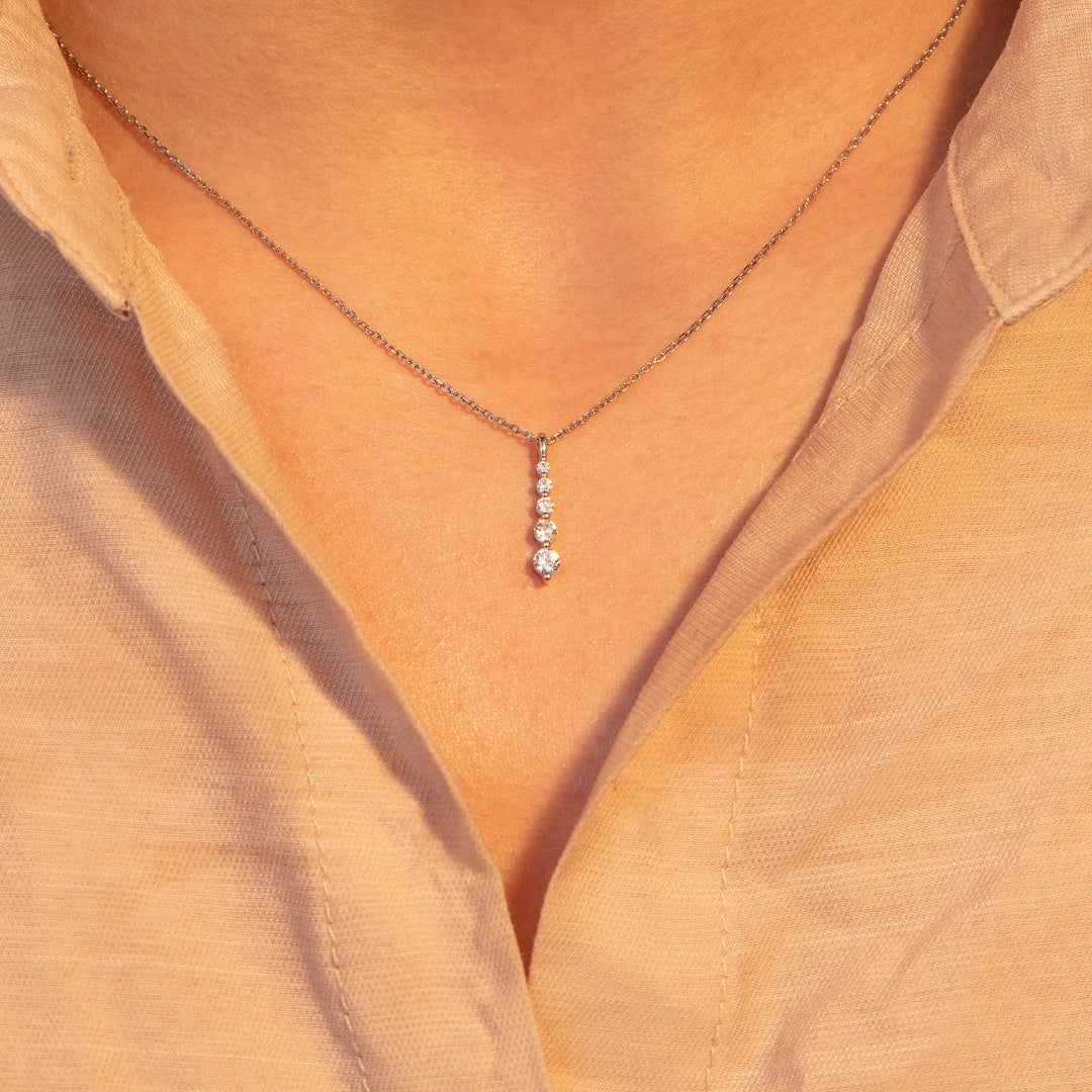 "Dripping water hollows out stone" Water Drop Diamond Necklace