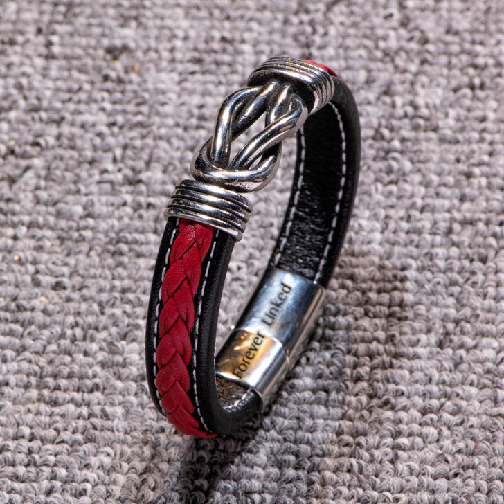 Detailed close-up of the braided leather on the son bracelet from mom.
