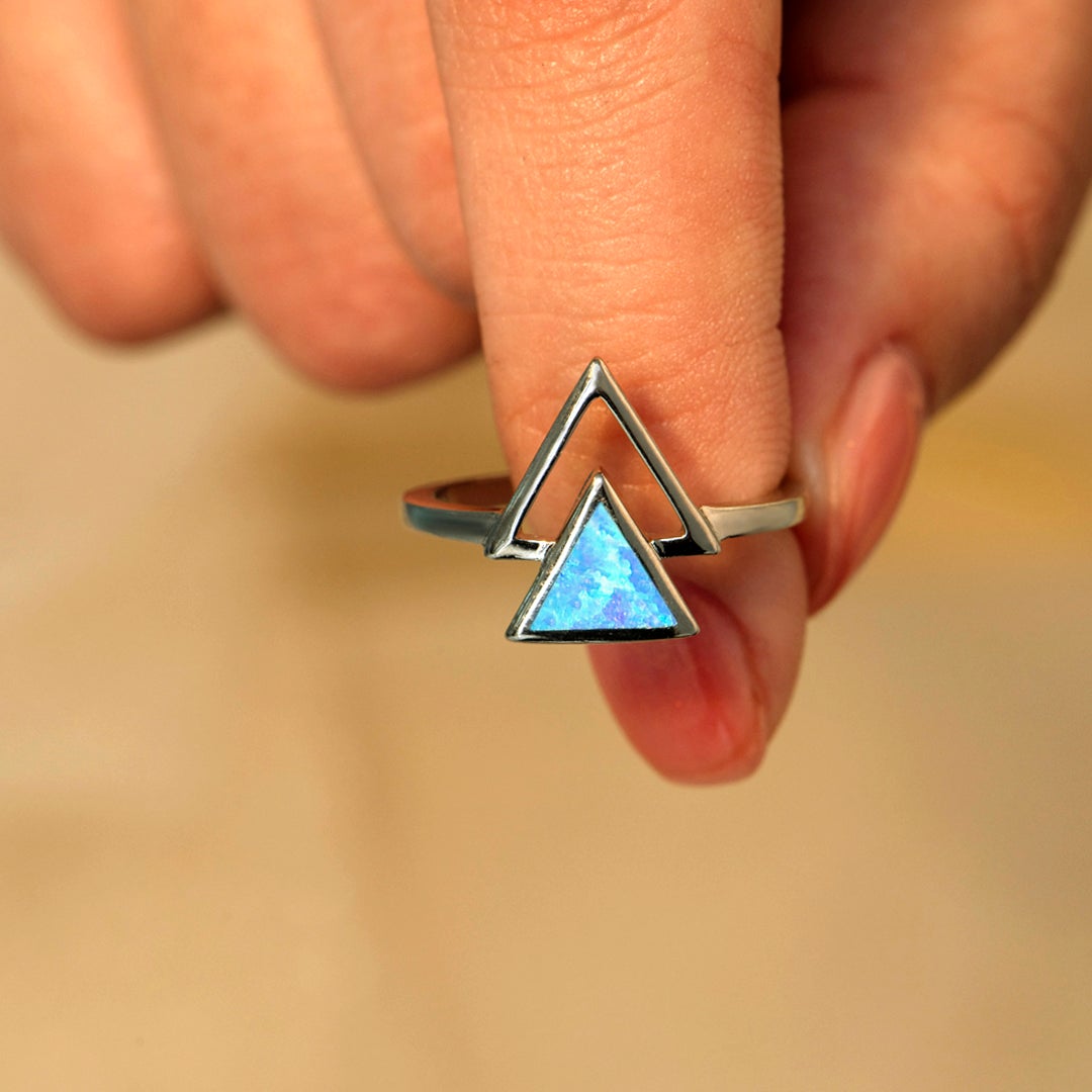 "A step forward with courage, self-confidence, and resilience." Triangle Opal Ring