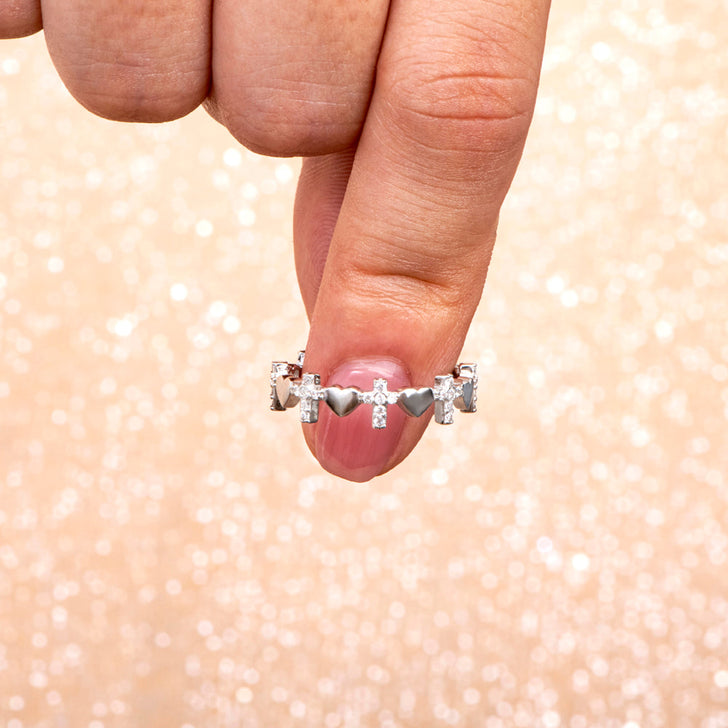 Prayer Ring detail showing cross heart design and powerful engraving.