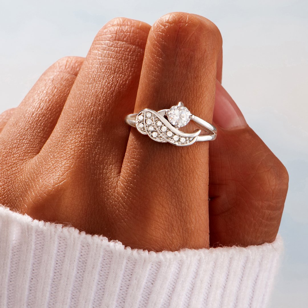 To my daughter "You are like an angel because Angels are always filled with love." Ring