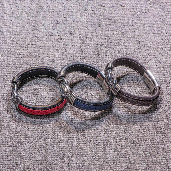 Detailed close-up of the engraving on the leather grandson bracelet.