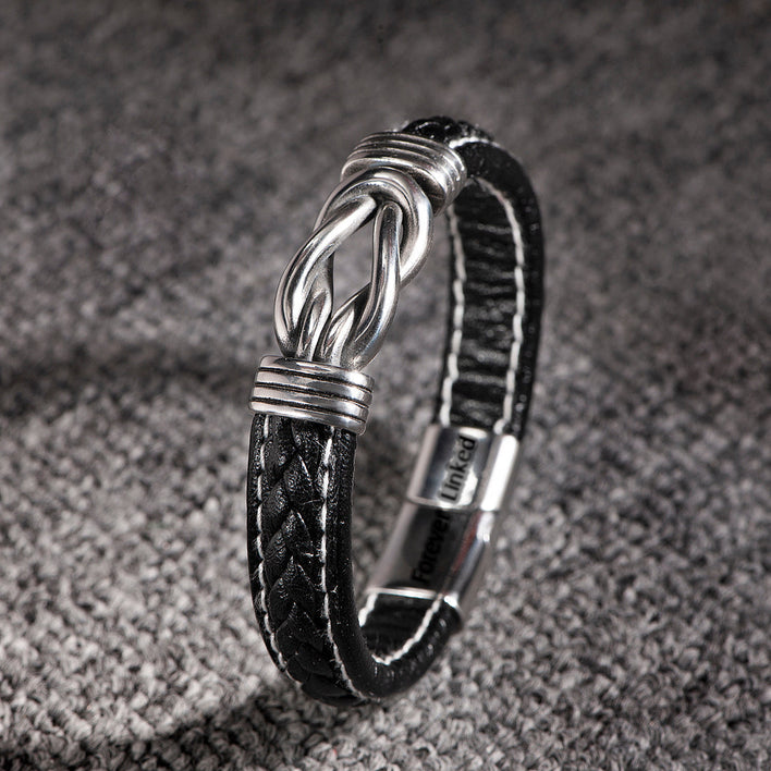 Detailed close-up of the braided leather on the son bracelet from mom.