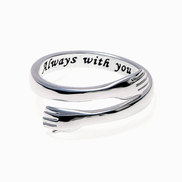Mom daughter matching rings on white background, close-up of the hug ring design.