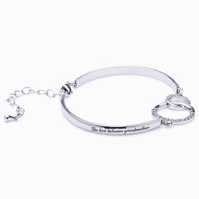 To My Granddaughter "The bond between a grandmother and granddaughter" Double Ring Bracelet