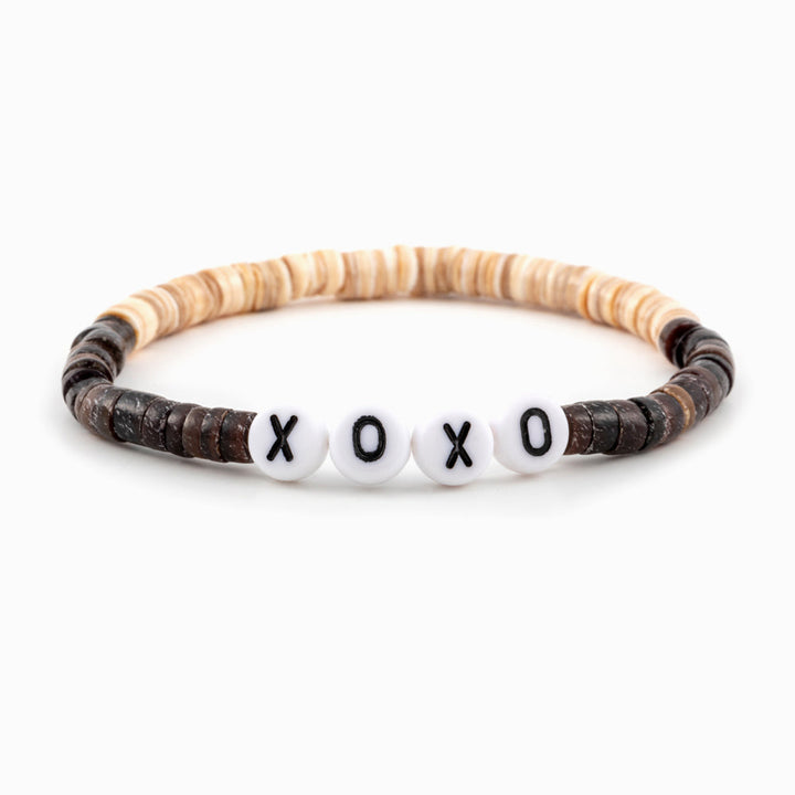 XOXO Beads Bracelet - Shell material, braided design.