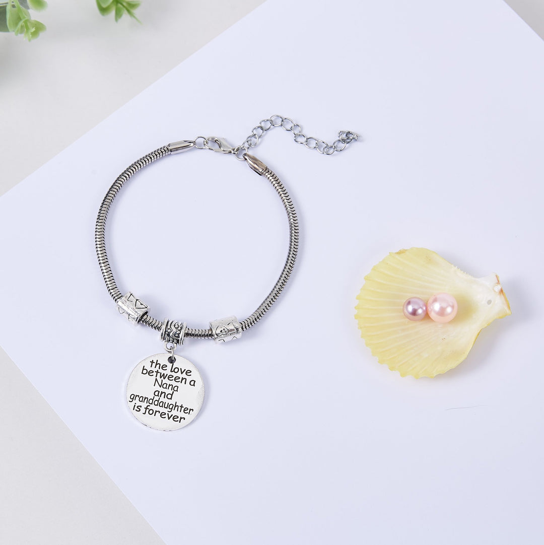 [Custom Name] TO MY GRANDDAUGHTER "THE LOVE BETWEEN A NANA AND GRANDDAUGHTER IS FOREVER" BRACELET - SARAH'S WHISPER