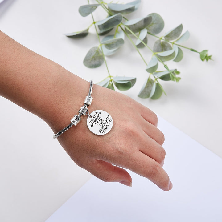[Custom Name] TO MY GRANDDAUGHTER "THE LOVE BETWEEN A NANA AND GRANDDAUGHTER IS FOREVER" BRACELET - SARAH'S WHISPER