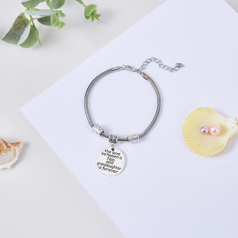TO MY GRANDDAUGHTER "THE LOVE BETWEEN A NAN AND GRANDDAUGHTER IS FOREVER" BRACELET - SARAH'S WHISPER