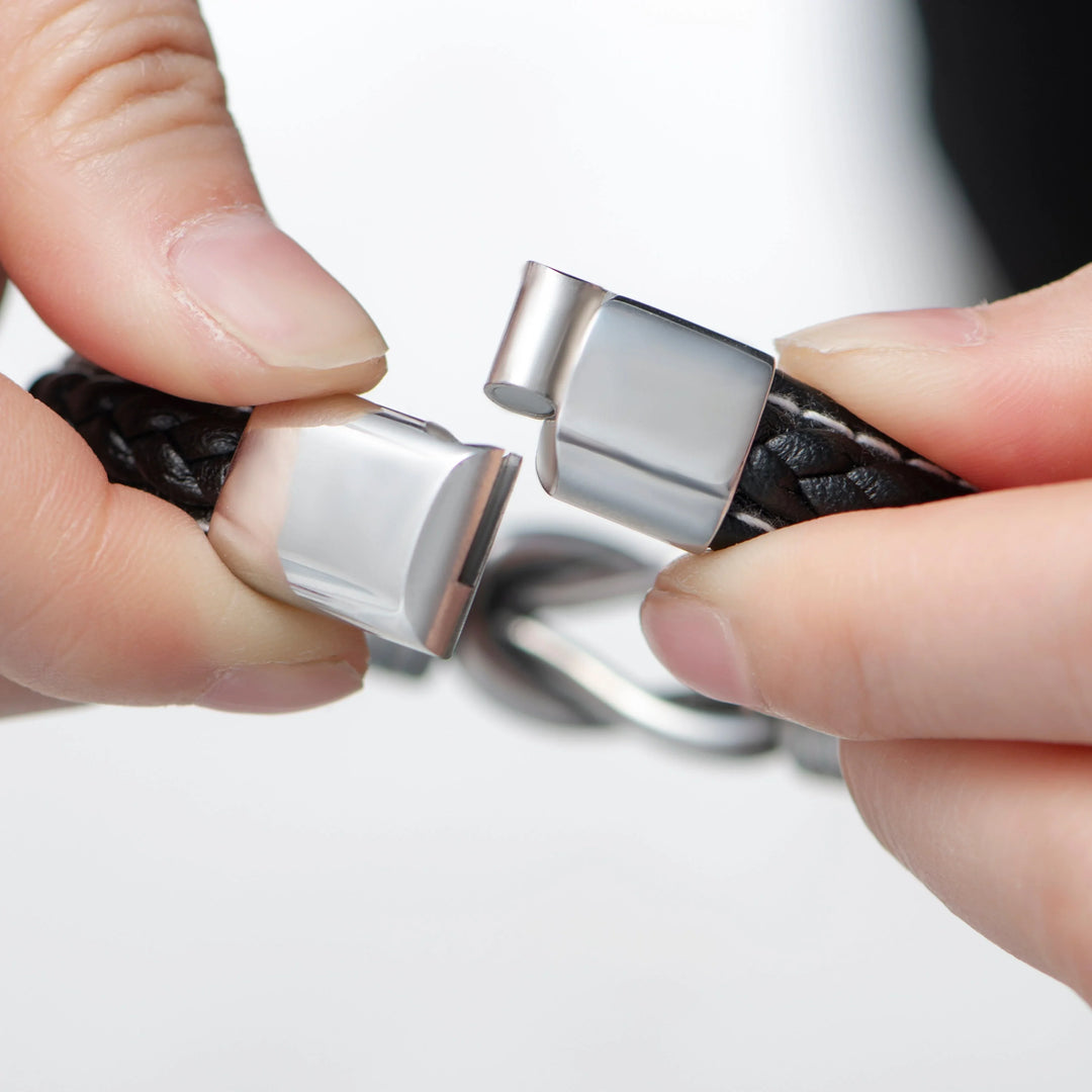 Detailed close-up of the engraving on the leather grandson bracelet.