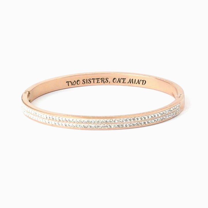 Sister bracelets with full diamond design on white background