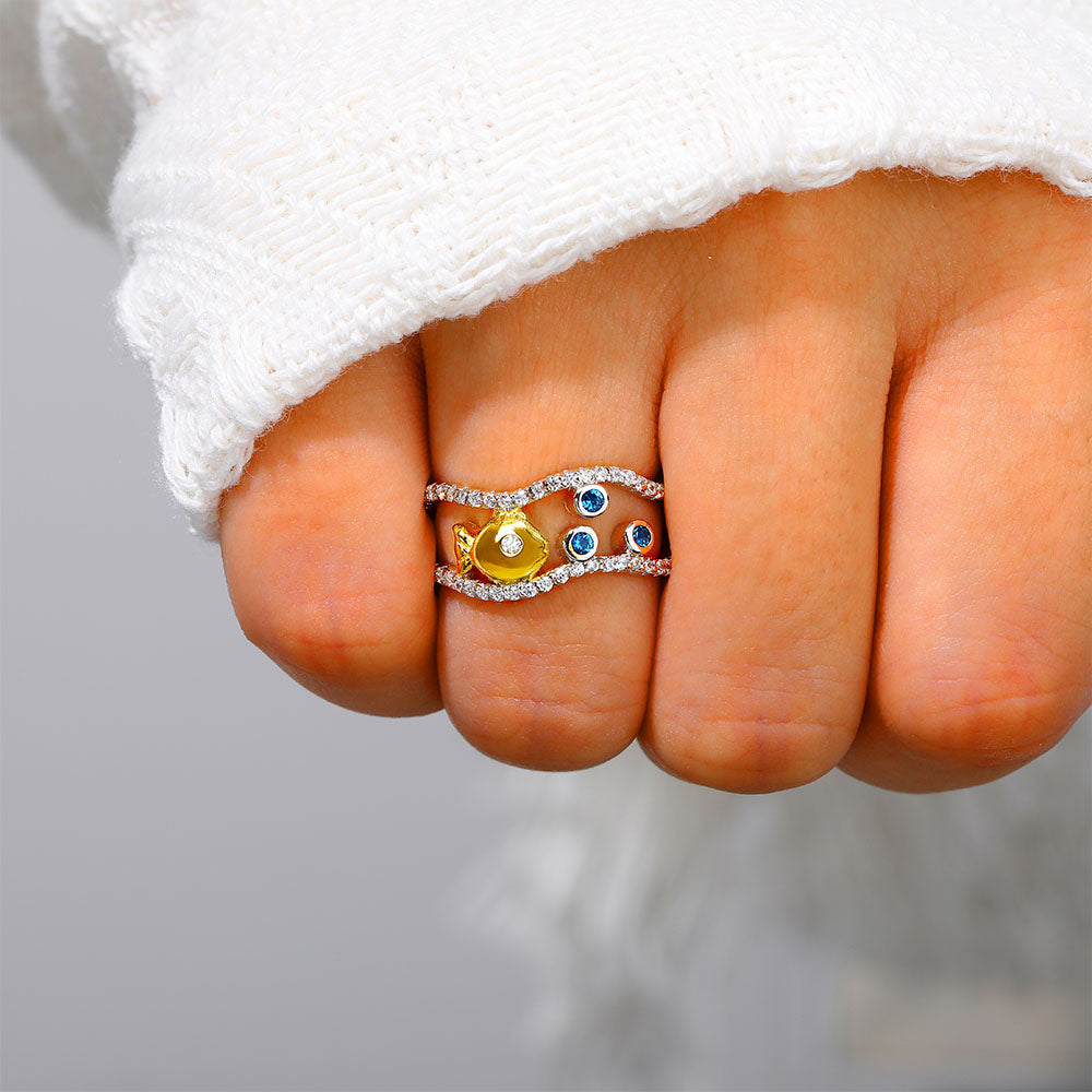 "Enjoy the bubbles of life" Bubble Fish Ring - Sterling silver ring with fish and bubbles design, symbolic of resilience and joy.