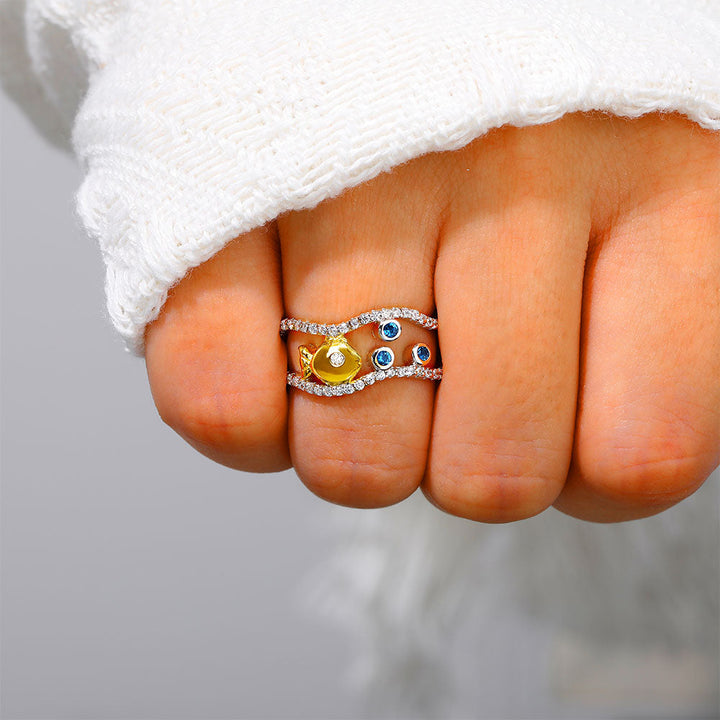 "Enjoy the bubbles of life" Bubble Fish Ring - Sterling silver ring with fish and bubbles design, symbolic of resilience and joy.