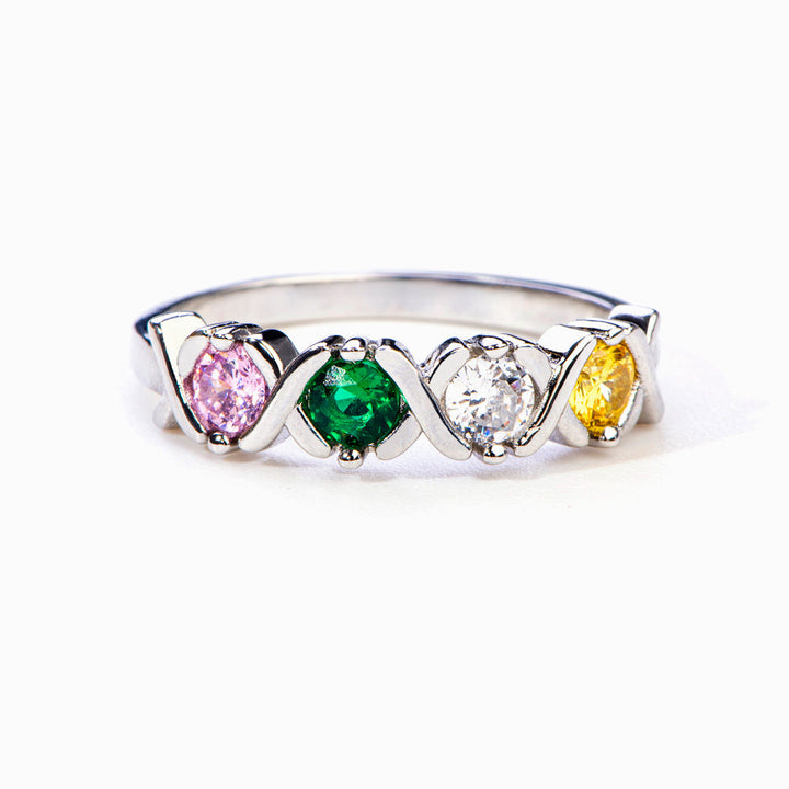 Close-up of Mother's Ring fertility design on white background