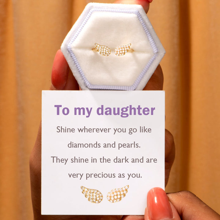 "To my daughter, shine wherever you go like pearls. They shine in the dark and are very precious as you." Adjustable Ring