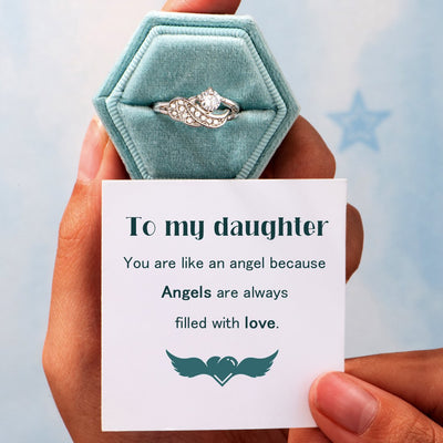 To my daughter "You are like an angel because Angels are always filled with love." Ring