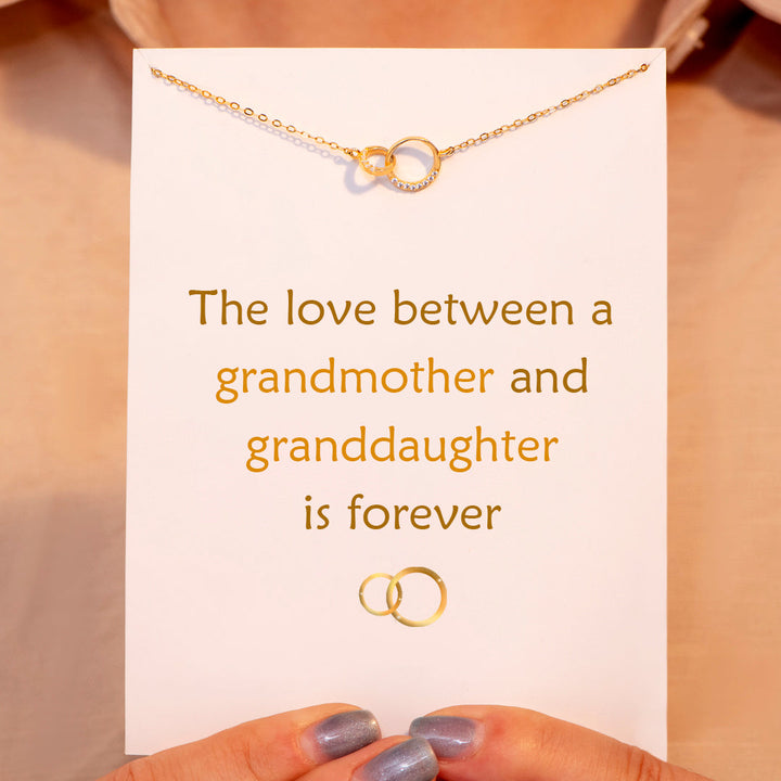 To My Granddaughter "The love between a grandmother and granddaughter is forever" Double Ring Necklace