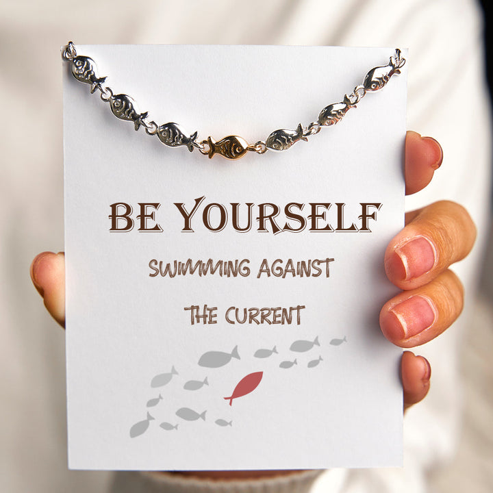 "Be yourself  swimming against the current" Fish Bracelet