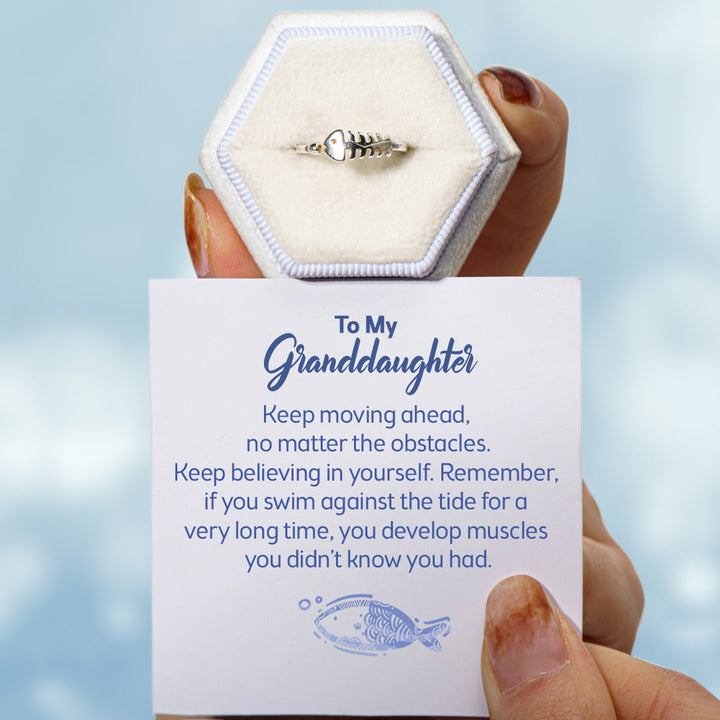 Gift card with swim against tide message for fishbone ring