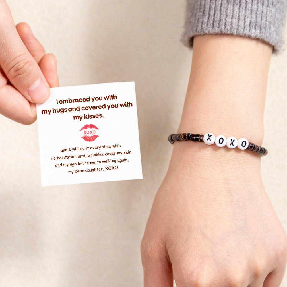 XOXO Beads Bracelet - Shell material, braided design.