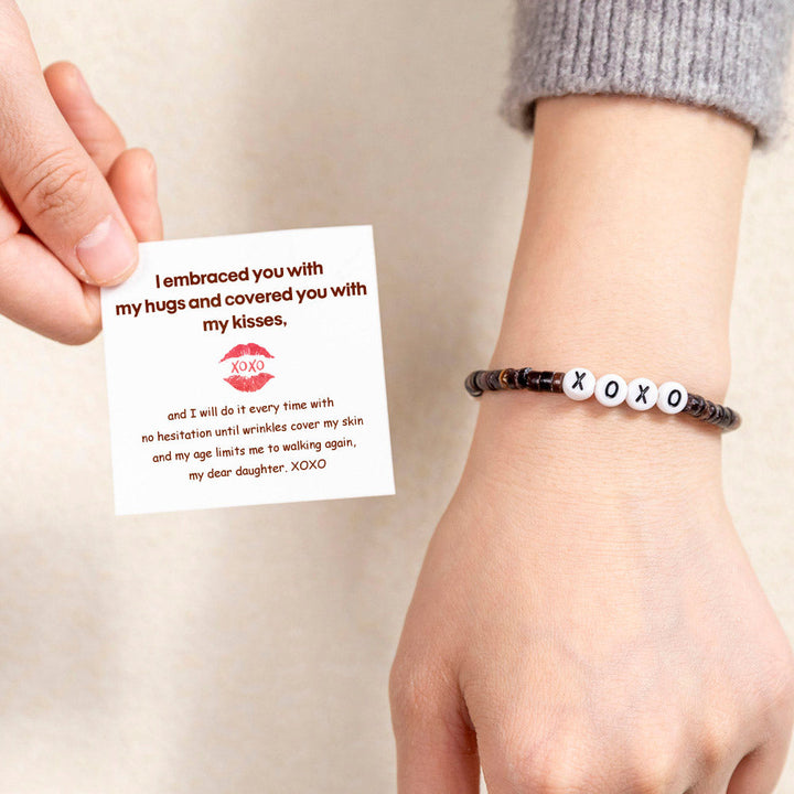 XOXO Beads Bracelet - Shell material, braided design.