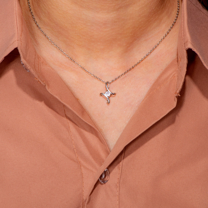 Mother wearing beautiful Mother's Day cross necklace
