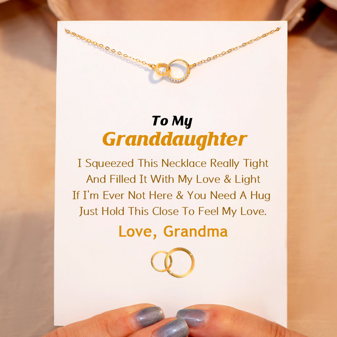 Personalized gift card accompanying double ring necklace for granddaughter, featuring a heartfelt grandmother-granddaughter quote.

