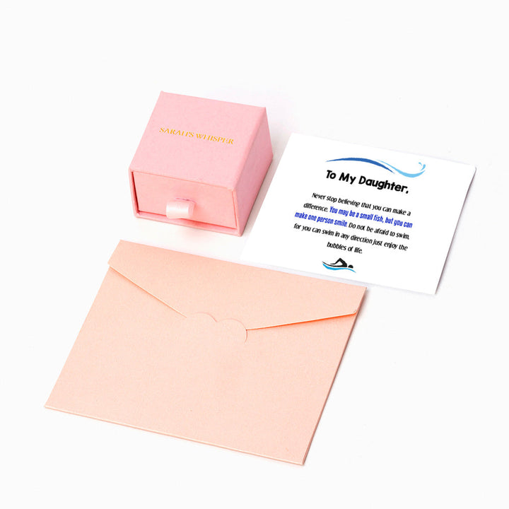 "Enjoy the bubbles of life" Bubble Fish Ring - Sterling silver ring with fish and bubbles design, symbolic of resilience and joy.