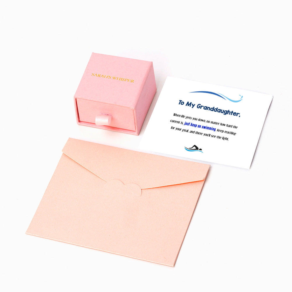 Luxury gift bag containing granddaughter's fish ring